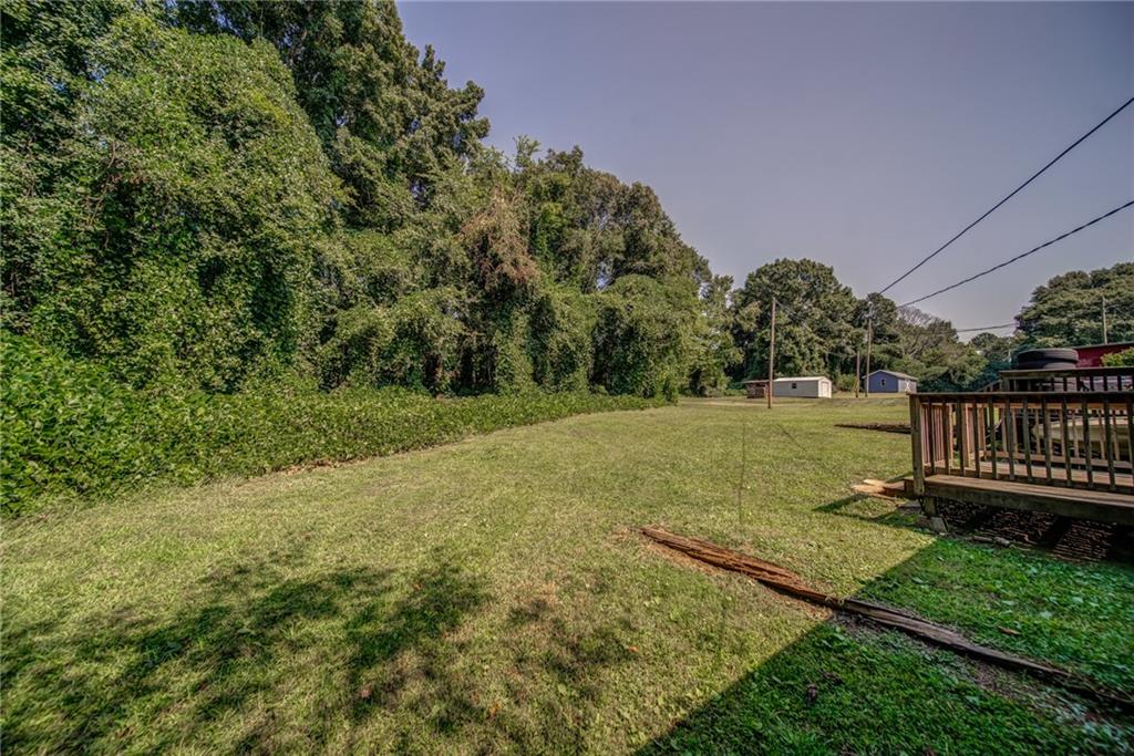 4355 East Paulding Drive, Unit A Dallas, GA 30157 - Photo 25 of 29 a view of a backyard with wooden fence