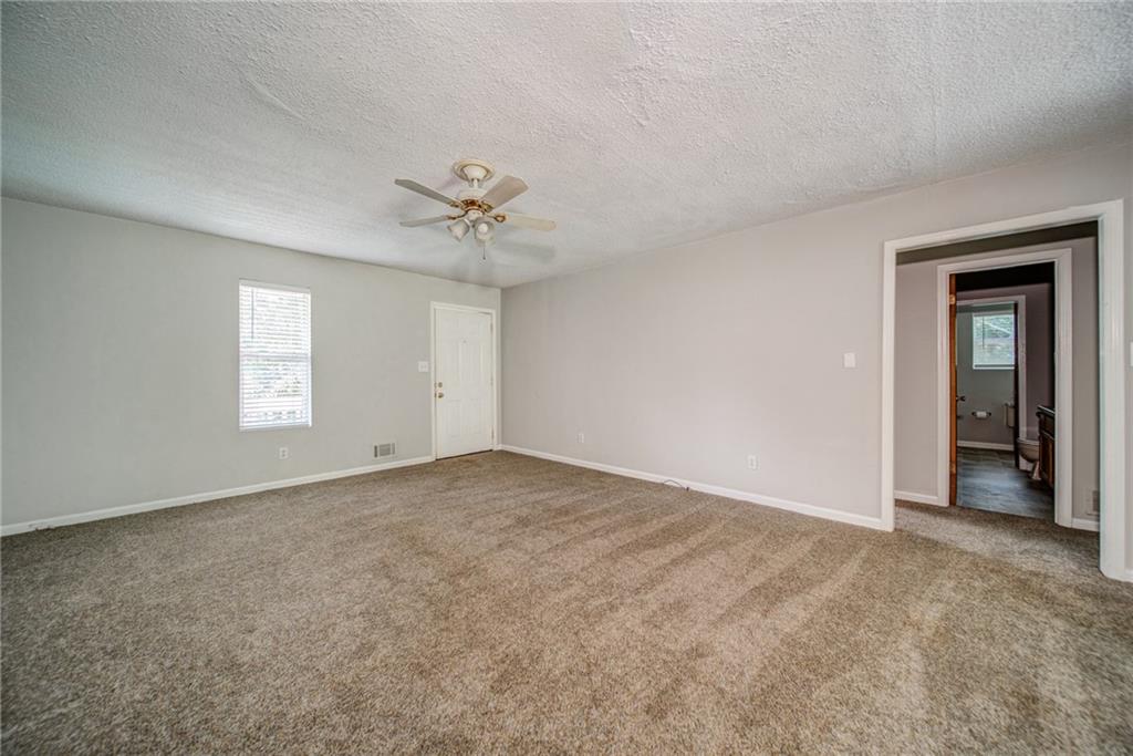 4355 East Paulding Drive, Unit A Dallas, GA 30157 - Photo 8 of 29 a view of an empty room with a window