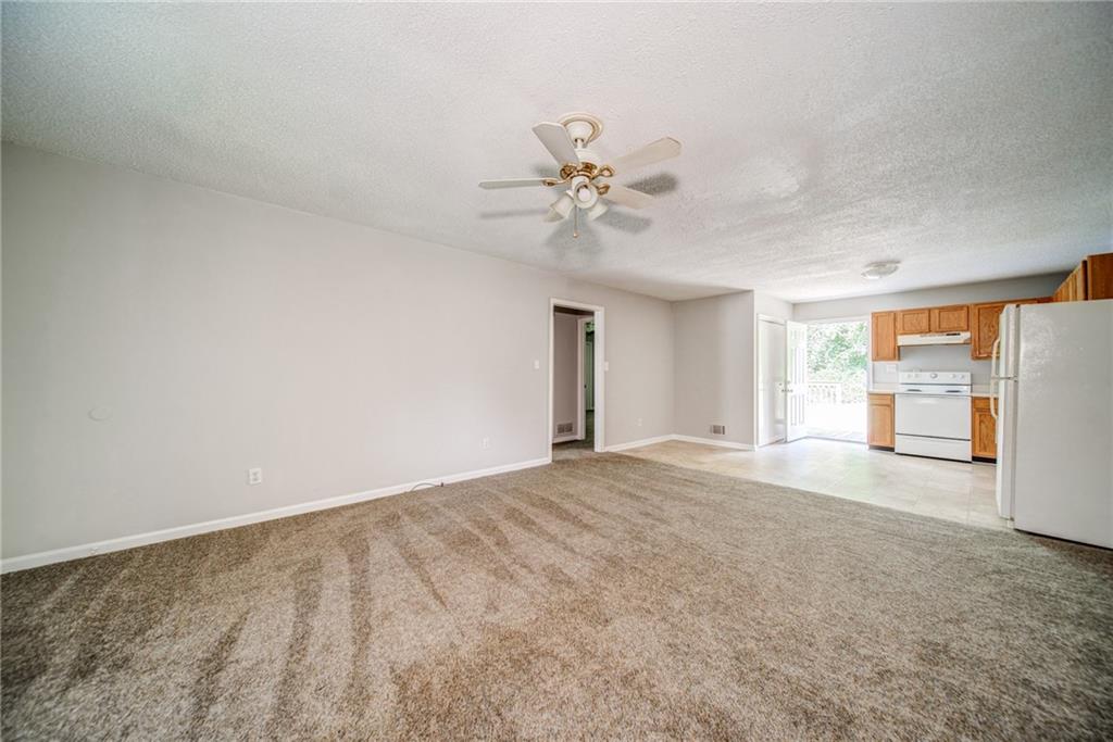 4355 East Paulding Drive, Unit A Dallas, GA 30157 - Photo 9 of 29 a view of an empty room with a window