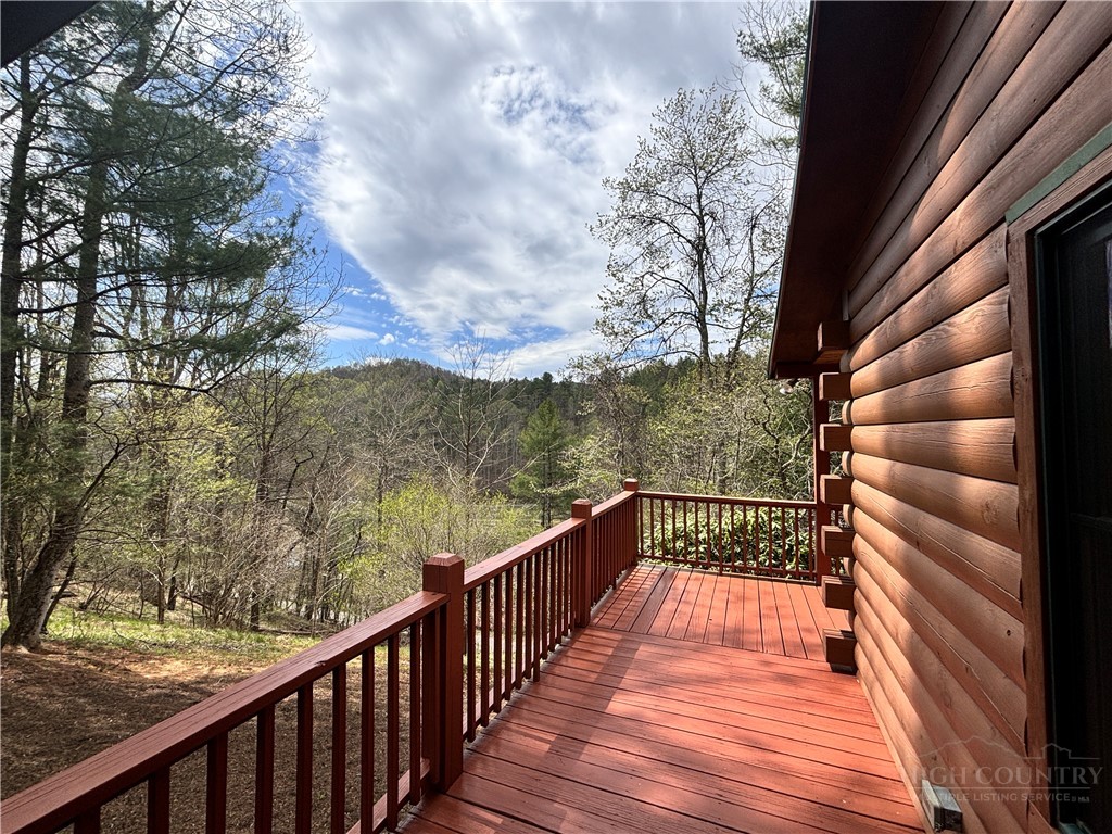 150 Turkey Ridge Crumpler, NC 28617 - Photo 2 of 40 a view of balcony with wooden floor and fence