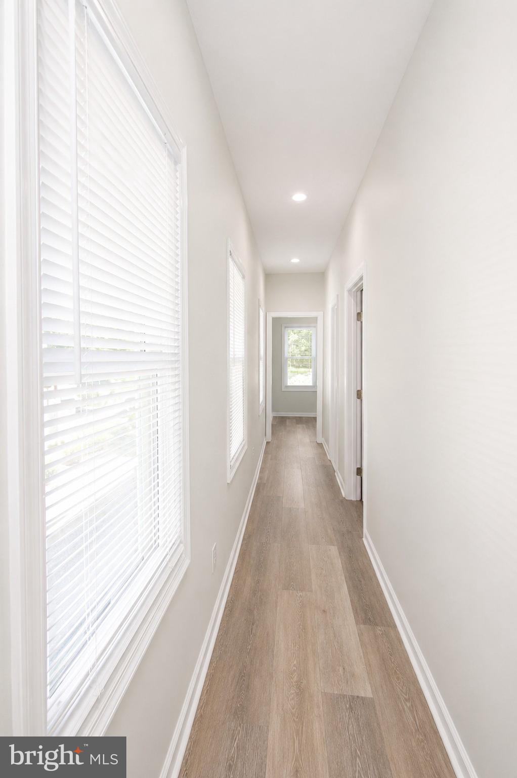 4319 Hadamar Road Spotsylvania, VA 22551 - Photo 20 of 24 a view of a hallway with wooden floor