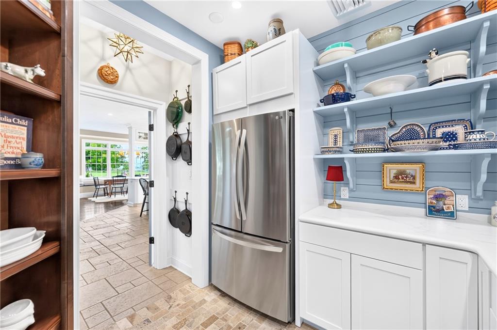 486 Settler Road Ligonier, PA 15658 - Photo 16 of 49 Coolest pantry ever!! So you have TWO new (2022) full size Kitchen Fridges, This one is an LG.
