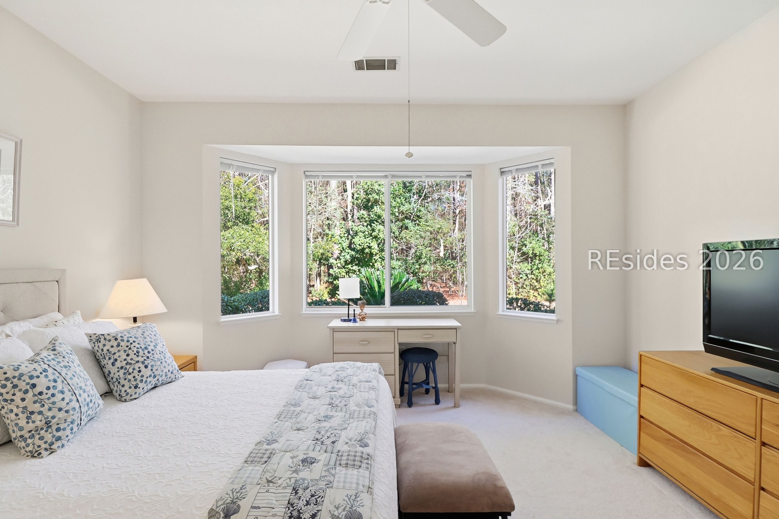33 Broughton Circle Bluffton, SC 29909 - Photo 13 of 36 Primary bedroom with peaceful backyard views