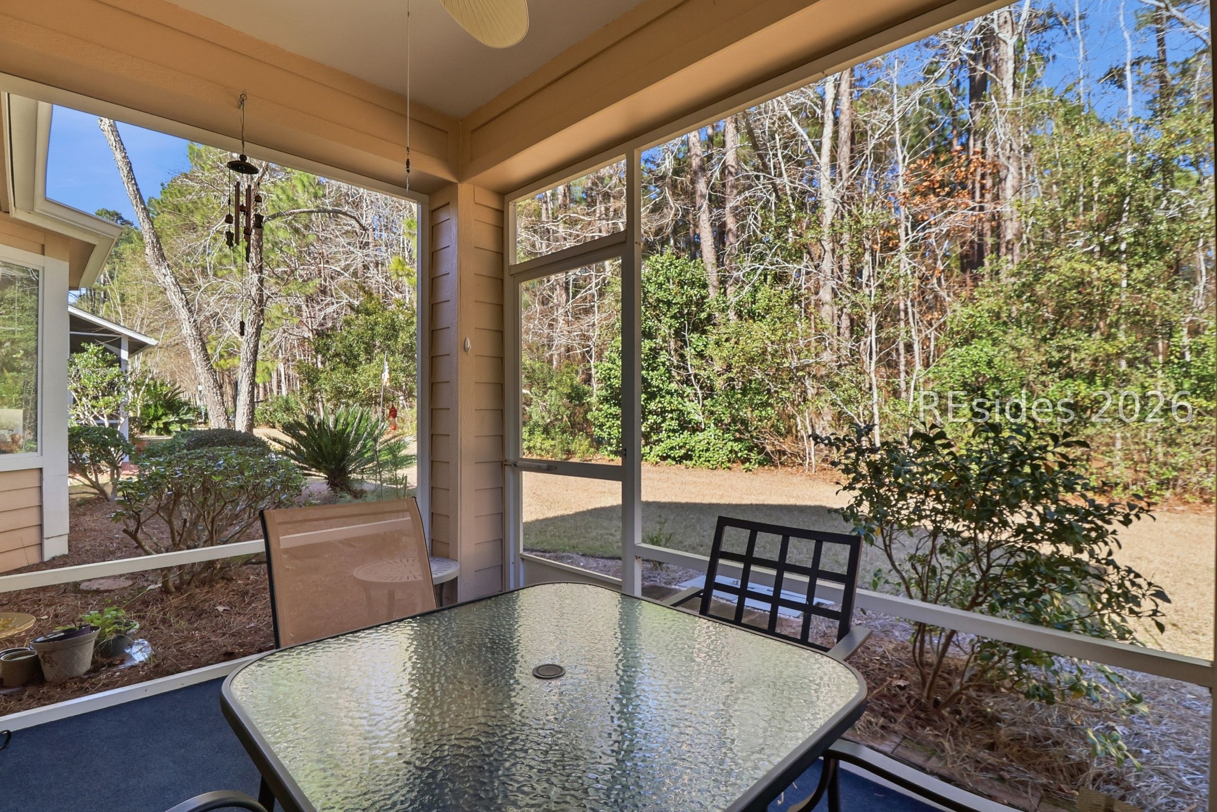33 Broughton Circle Bluffton, SC 29909 - Photo 20 of 36 Screened porch with peaceful wooded views