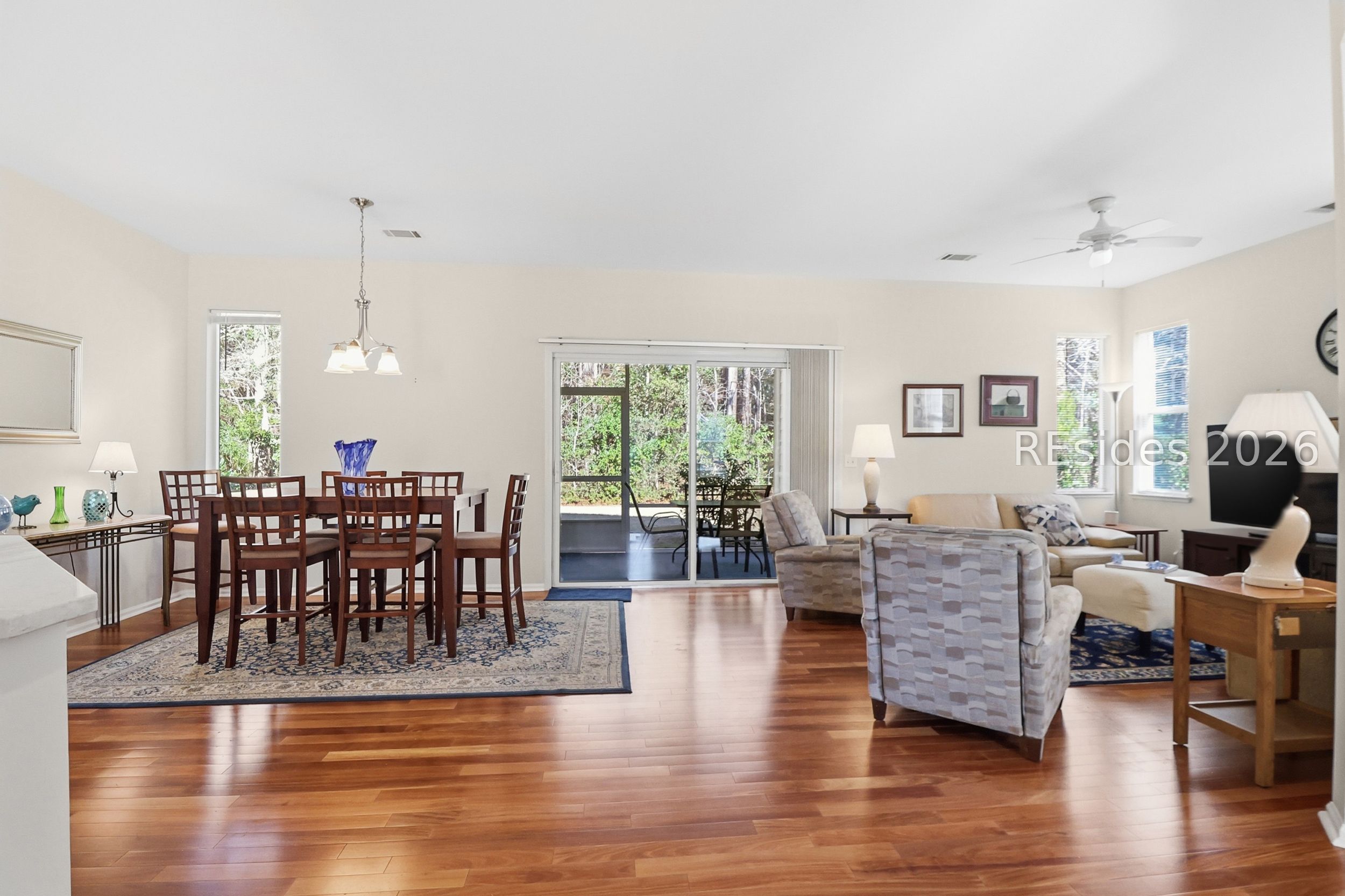 33 Broughton Circle Bluffton, SC 29909 - Photo 3 of 36 Open living and dining area with wood floors