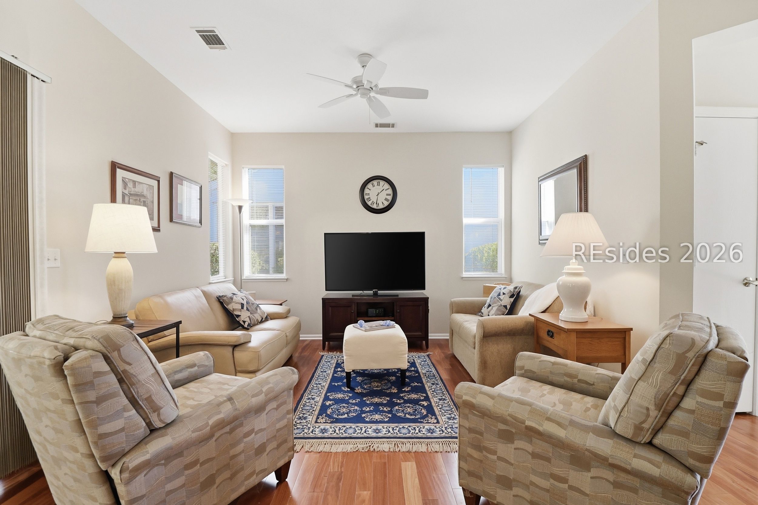 33 Broughton Circle Bluffton, SC 29909 - Photo 10 of 36 Light-filled living room with neutral tones