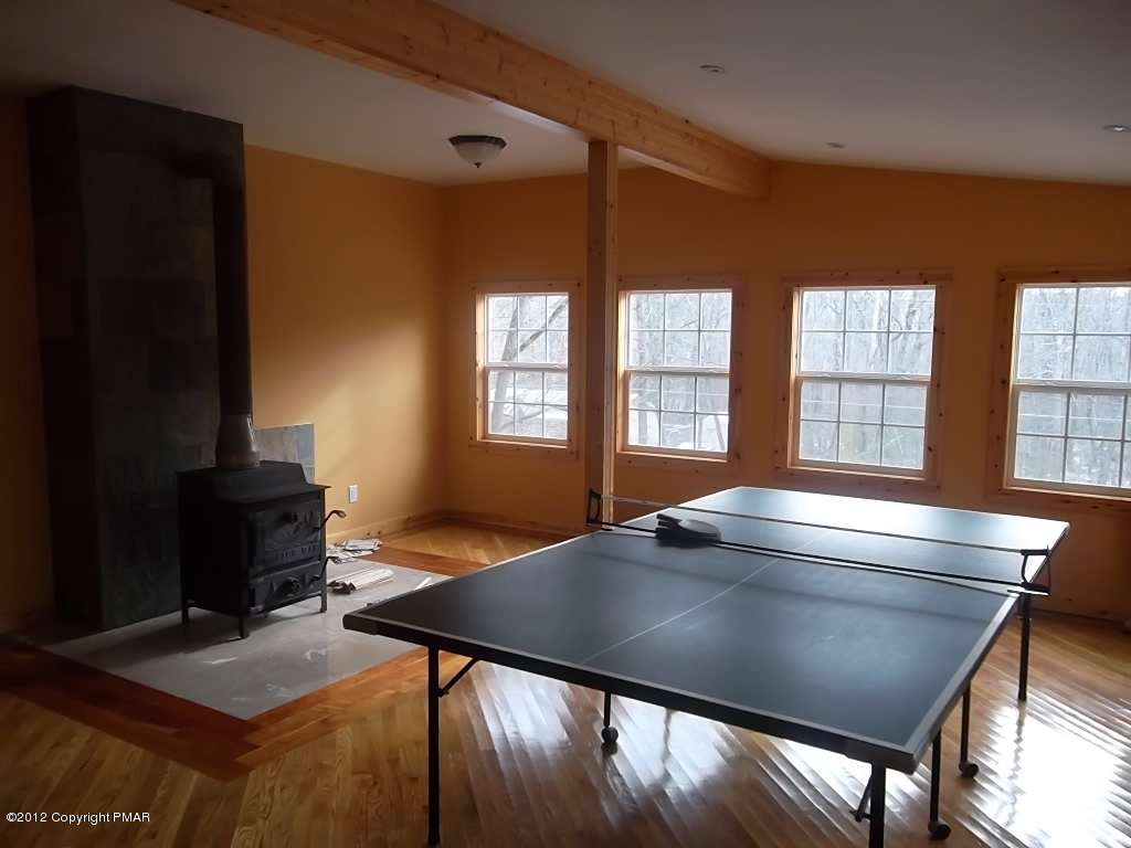 102 Rock Road Dingmans Ferry, PA 18328 - Photo 7 of 13 a view of a dining room with furniture and window