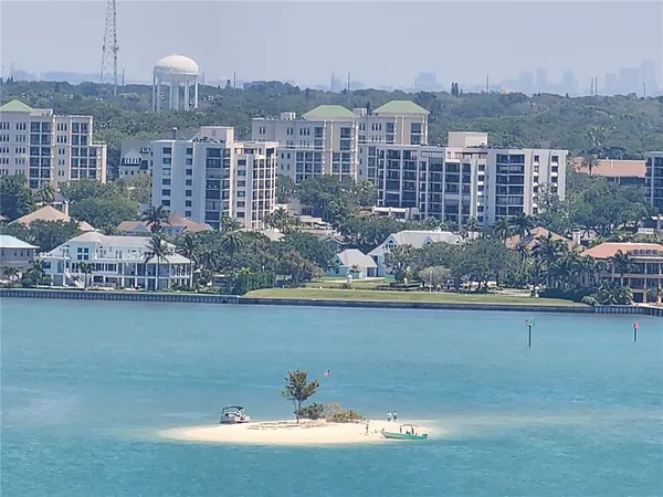 a view of a city with tall buildings