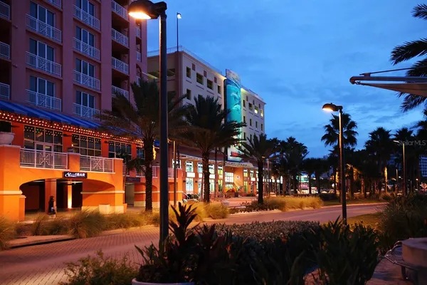 a view of a palm trees front of a house