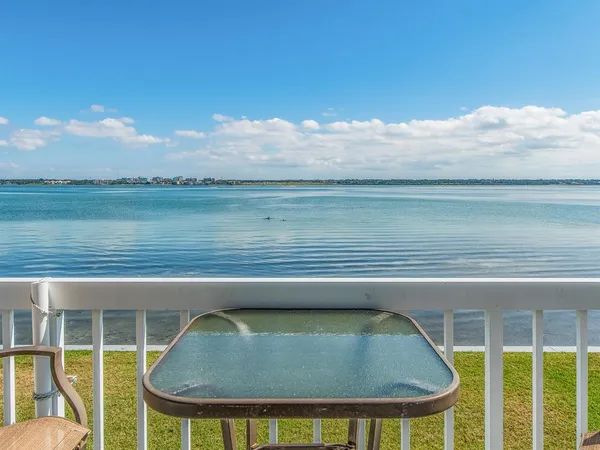 a view of swimming pool from a balcony