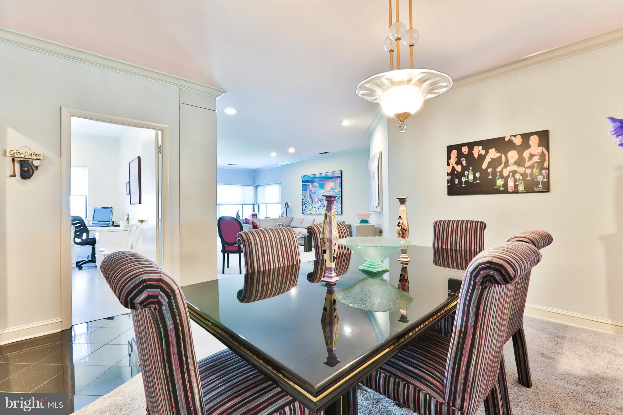 3021 Fallstaff Road, Unit 605B Baltimore, MD 21209 - Photo 10 of 22 Open view to living and kitchen from dining room