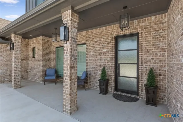 a bathroom with a shower and a sink