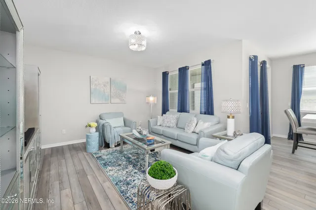 a bedroom with a bed and a table