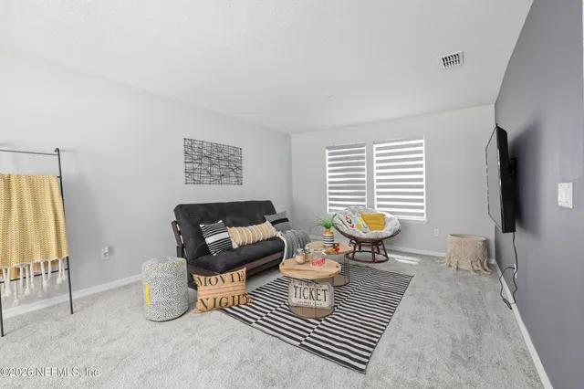 a bathroom with a toilet and shower