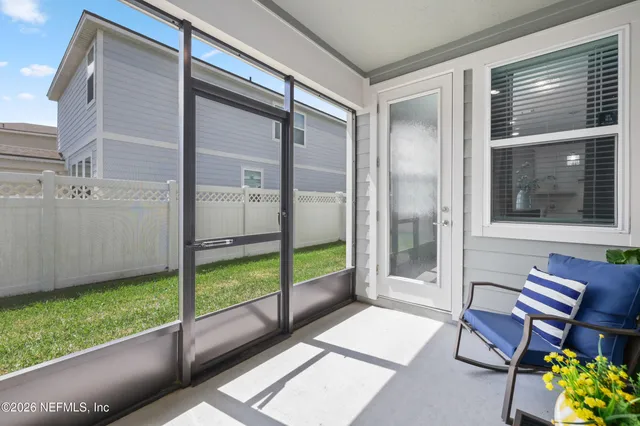 a view of house with yard and green space