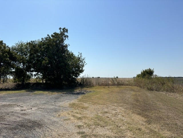 R019628 Old Georgetown Road Taylor, TX 76574 - Photo 5 of 7 a view of outdoor space and yard