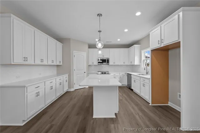 a large kitchen with cabinets