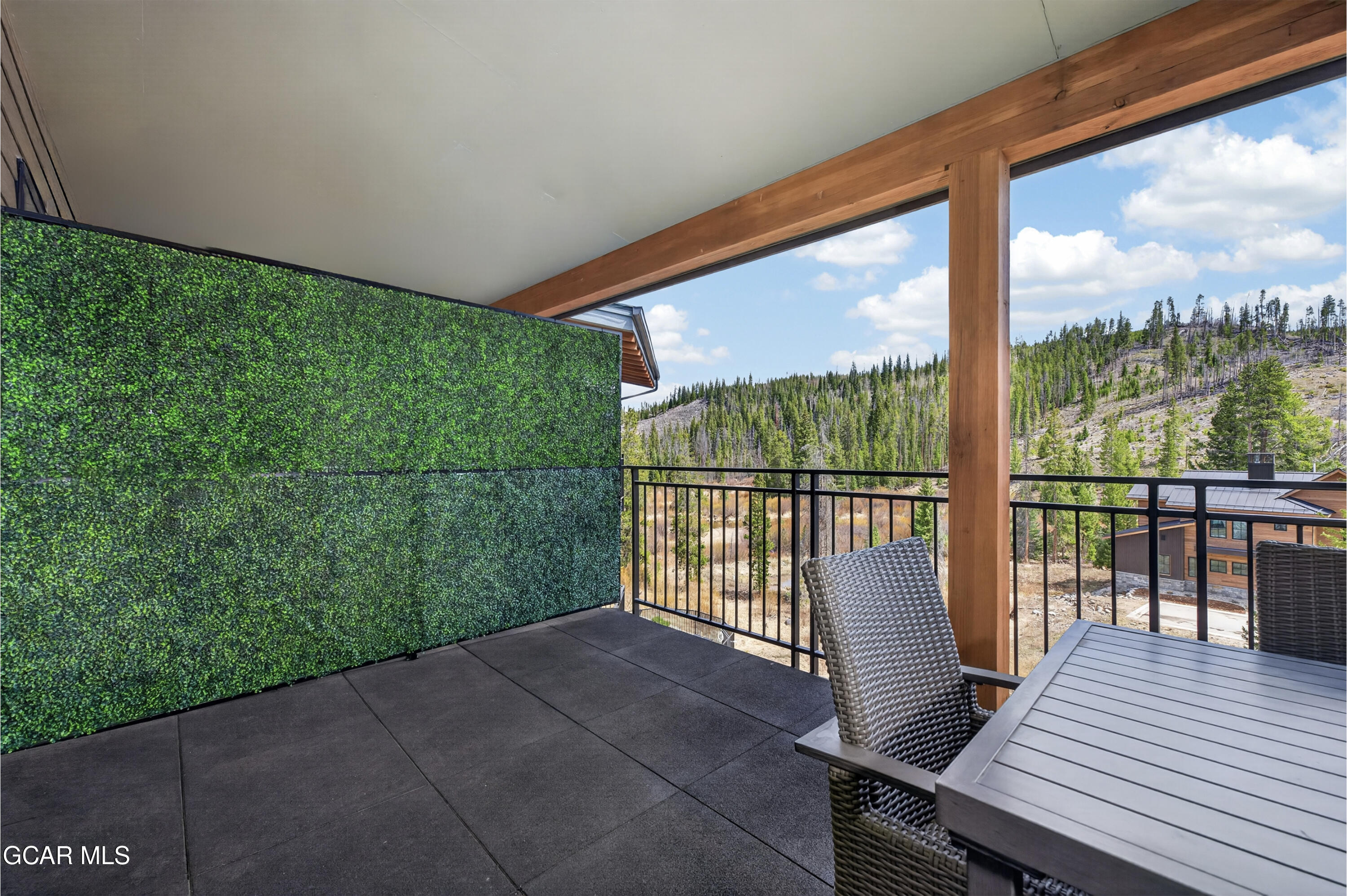144 Ski Idlewild Road, Unit 2404 Winter Park, CO 80482 - Photo 15 of 43 a balcony with wooden floor in outdoor space