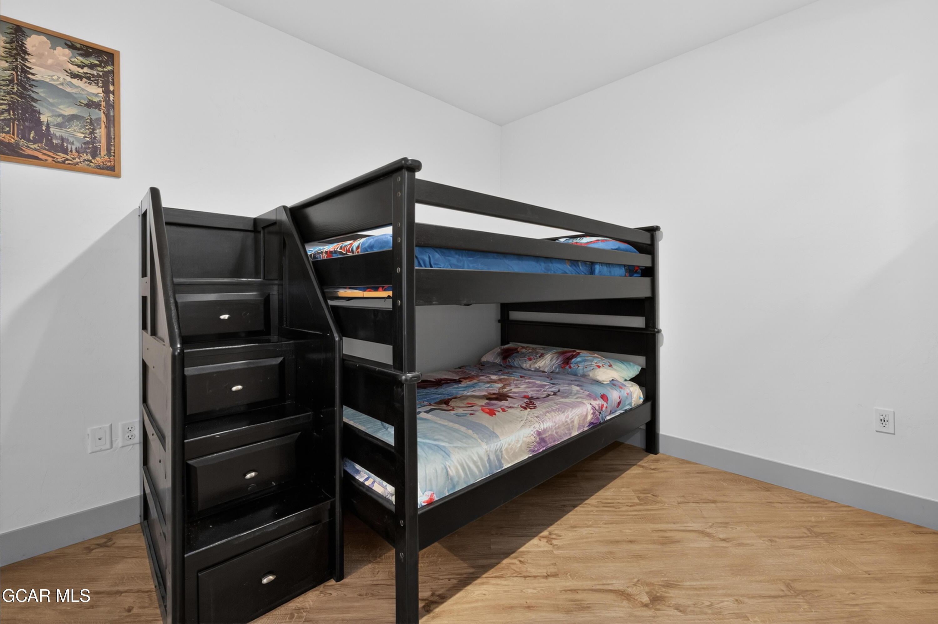 144 Ski Idlewild Road, Unit 2404 Winter Park, CO 80482 - Photo 24 of 43 a bedroom with a bed and a closet