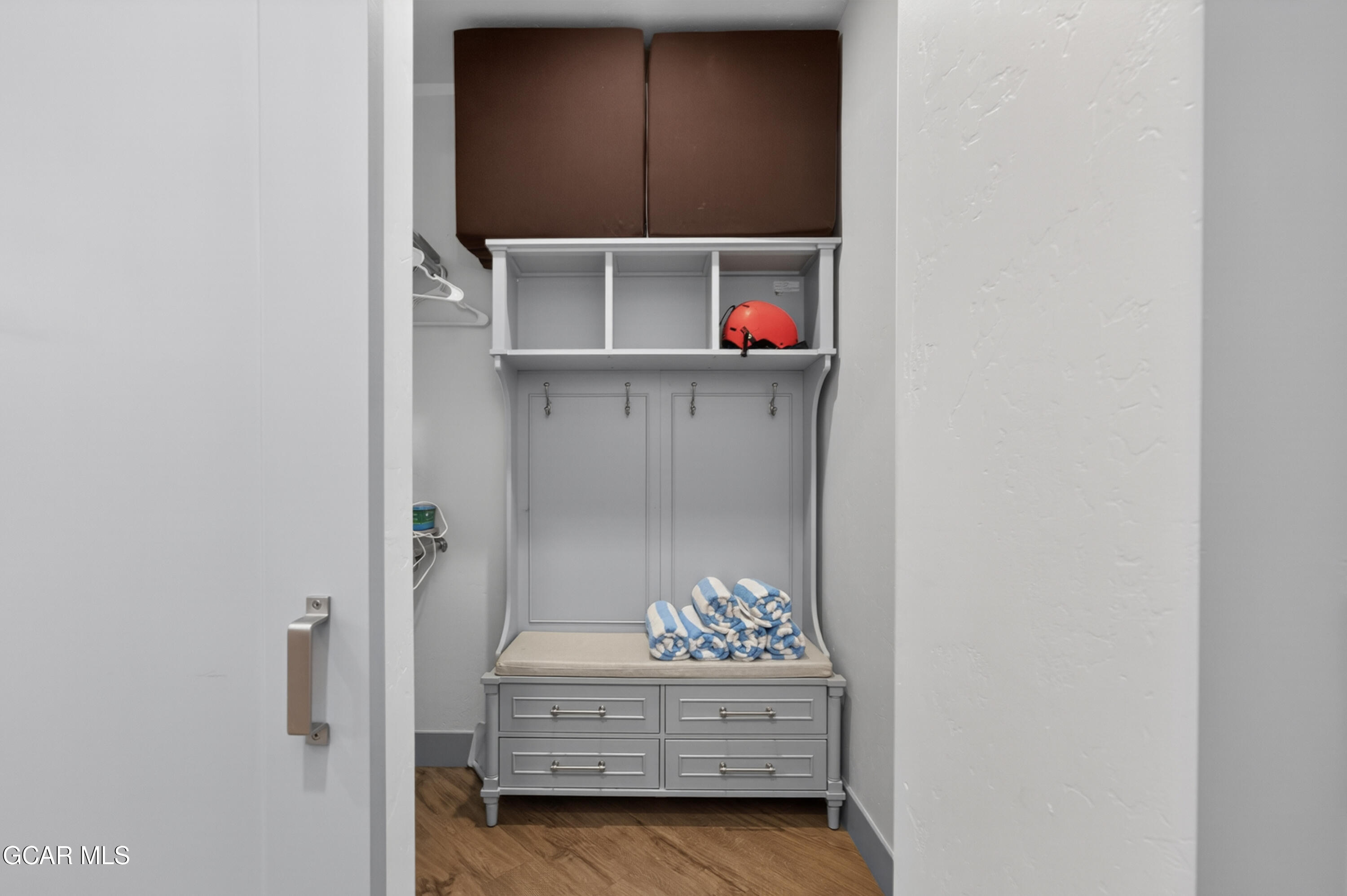 144 Ski Idlewild Road, Unit 2404 Winter Park, CO 80482 - Photo 27 of 43 a hallway with storage and a sink