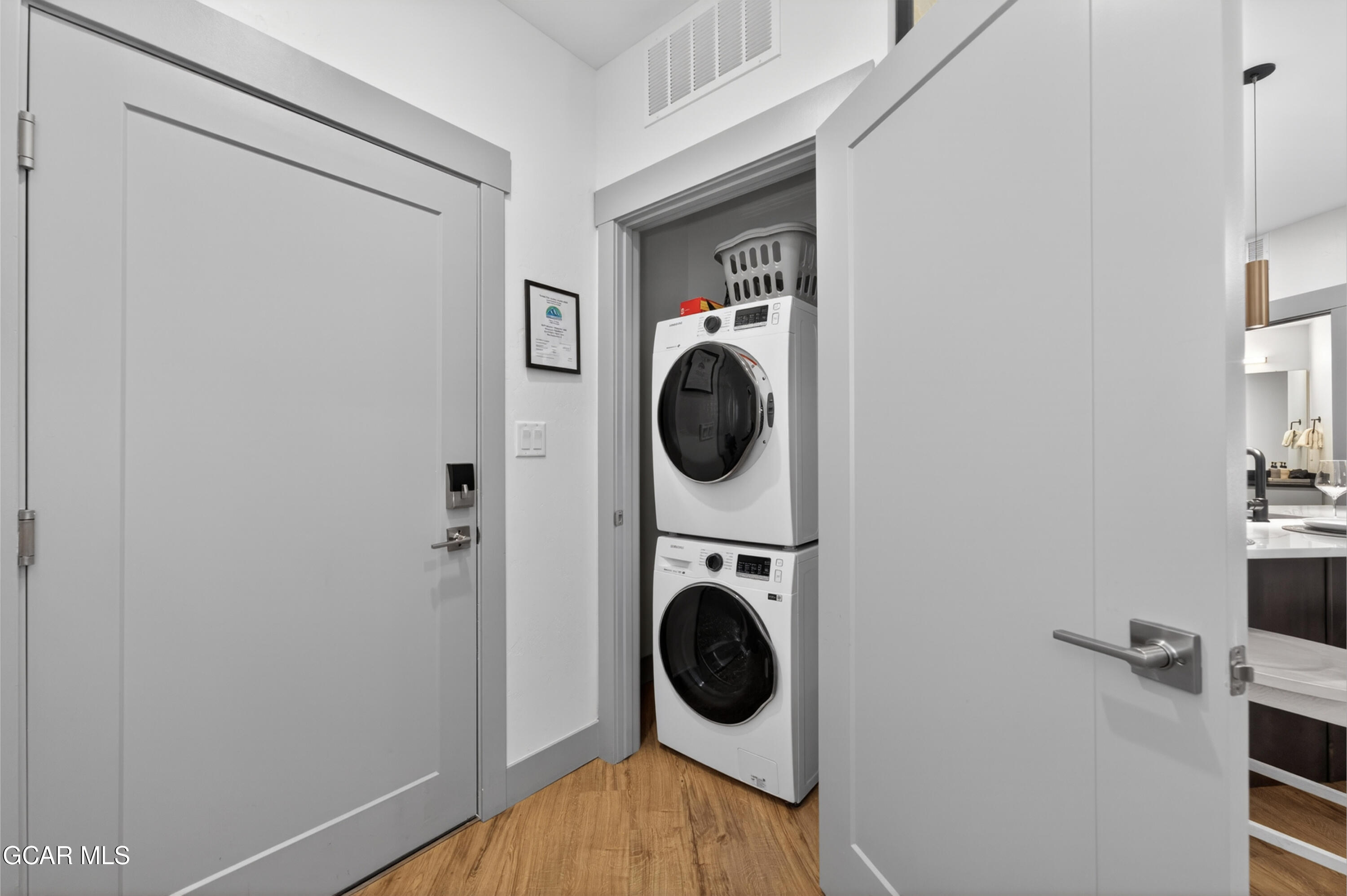 144 Ski Idlewild Road, Unit 2404 Winter Park, CO 80482 - Photo 28 of 43 a utility room with dryer and washer