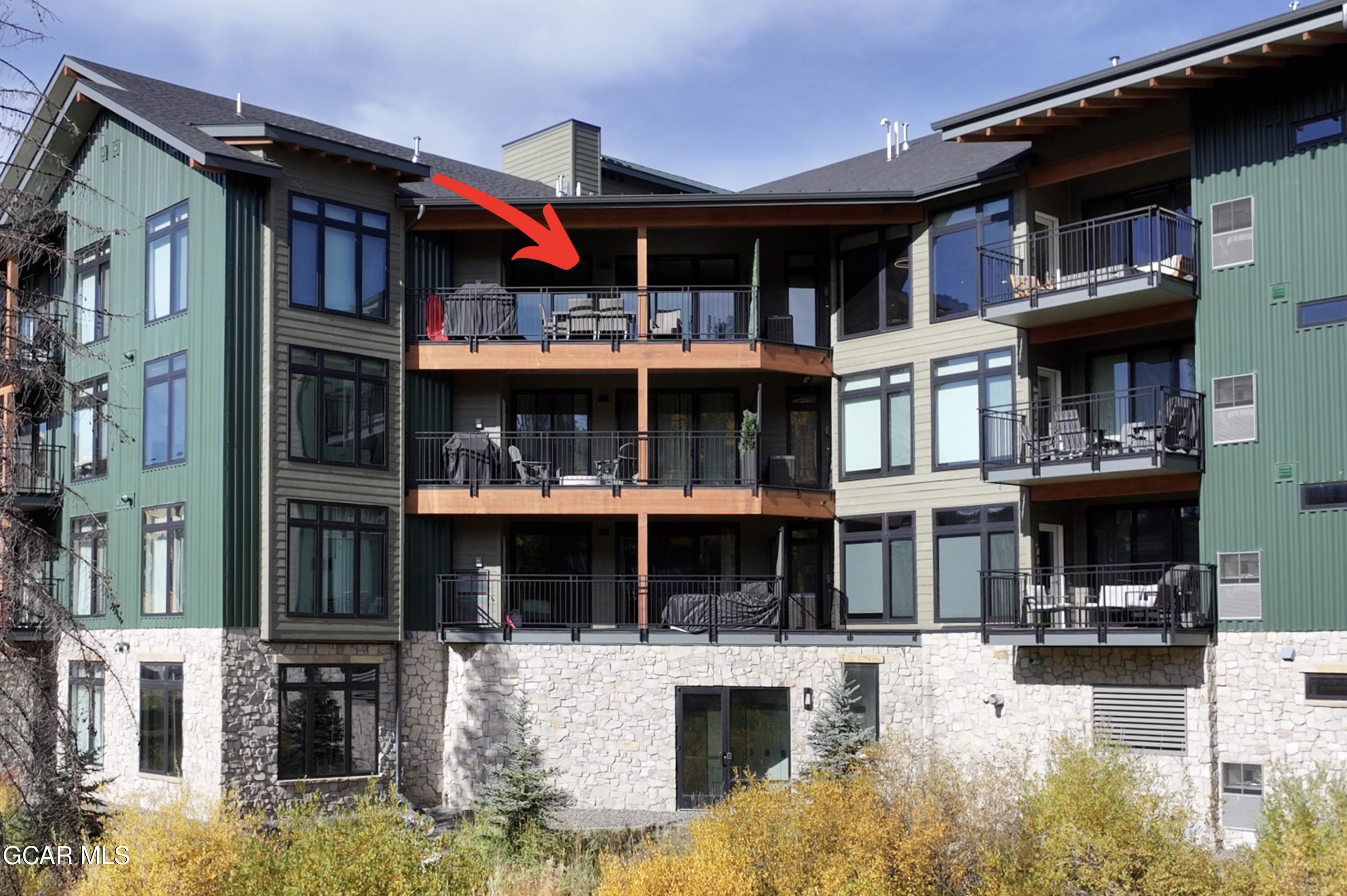 144 Ski Idlewild Road, Unit 2404 Winter Park, CO 80482 - Photo 3 of 43 a view of building with large windows