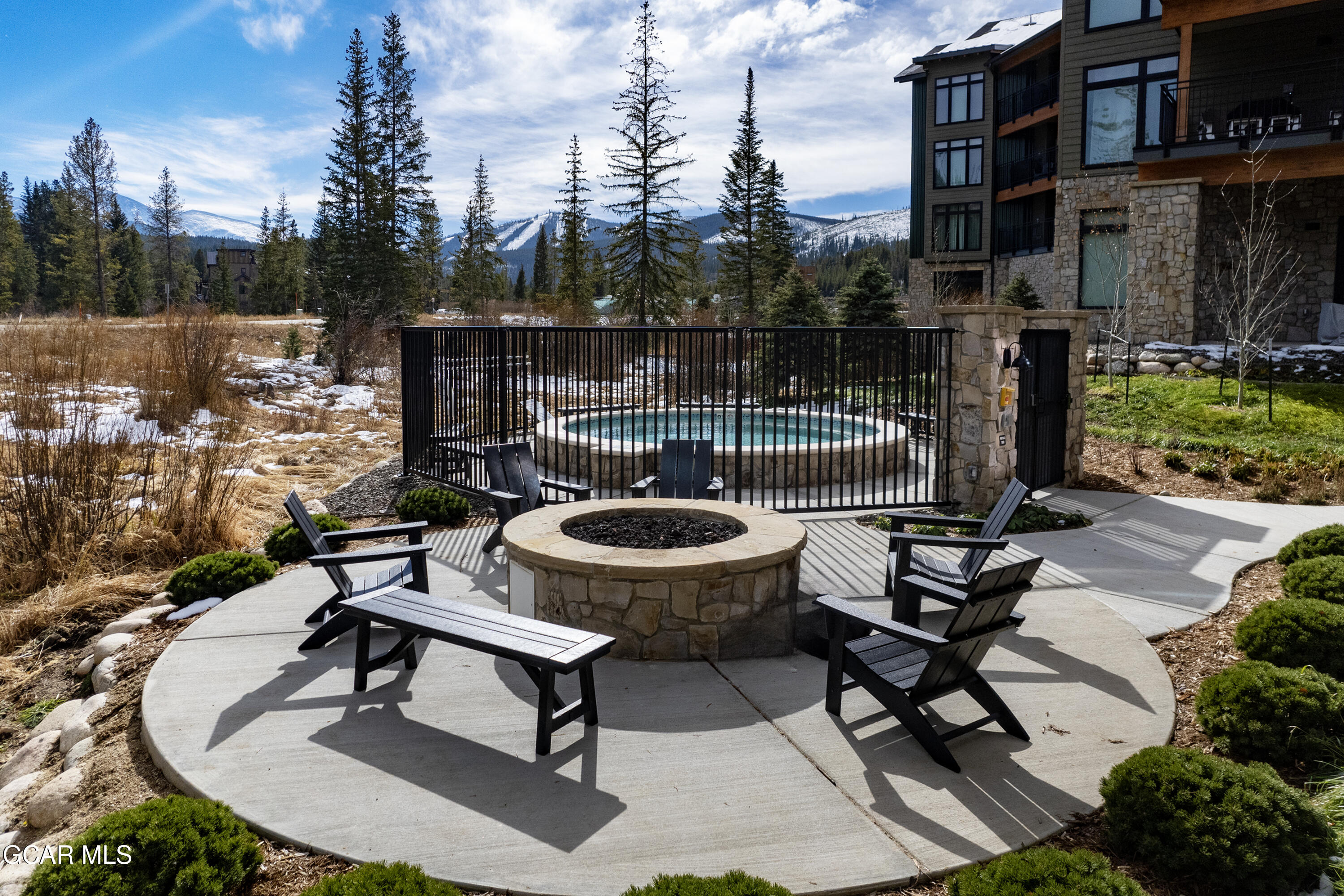 144 Ski Idlewild Road, Unit 2404 Winter Park, CO 80482 - Photo 38 of 43 a view of a backyard with sitting area and furniture