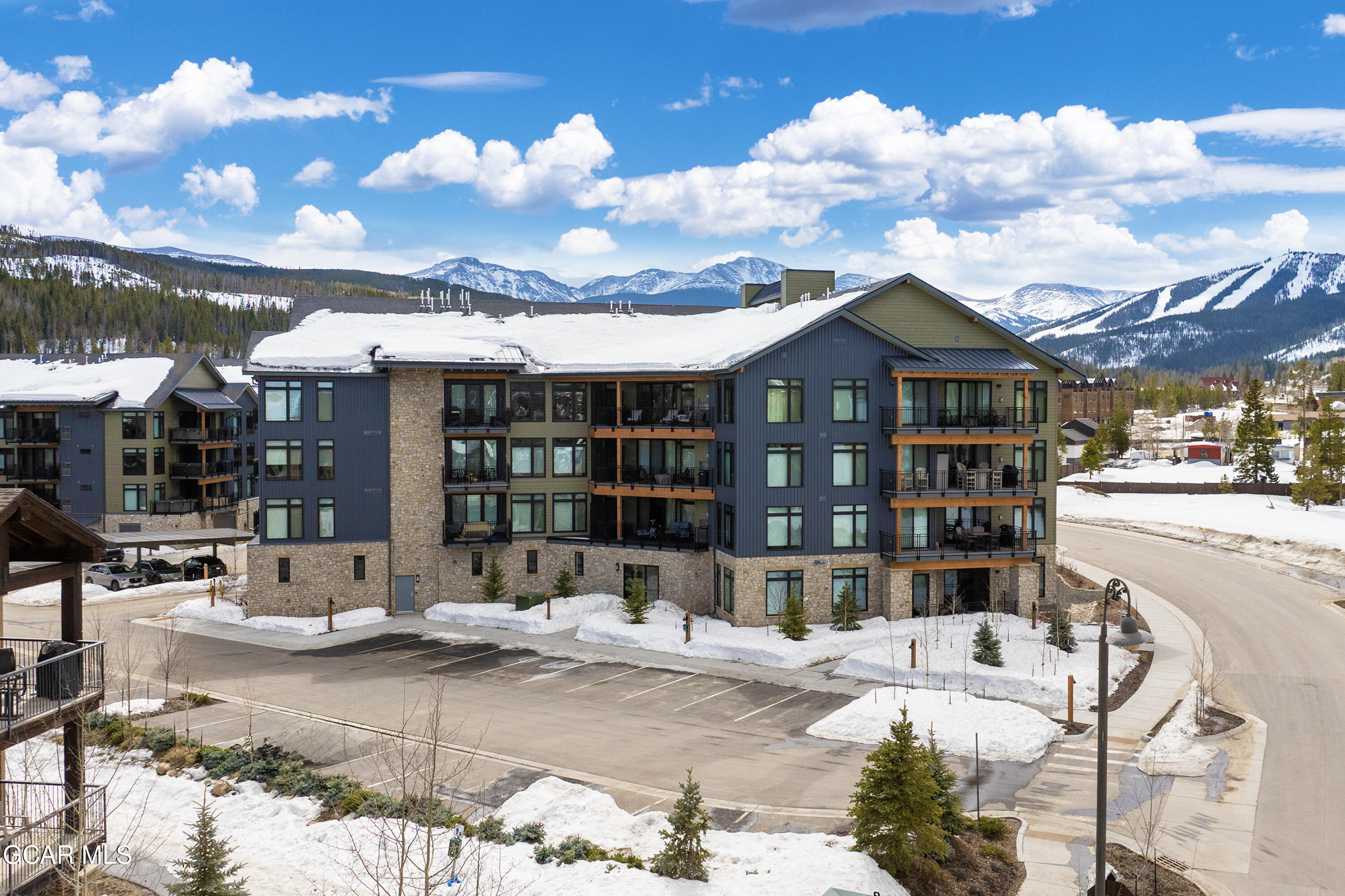 144 Ski Idlewild Road, Unit 2404 Winter Park, CO 80482 - Photo 42 of 43 a view of a patio with swimming pool table and chairs