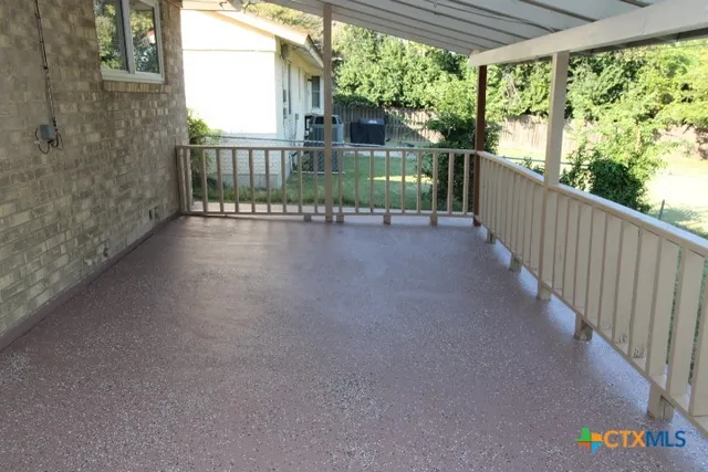 a view of a street from a balcony