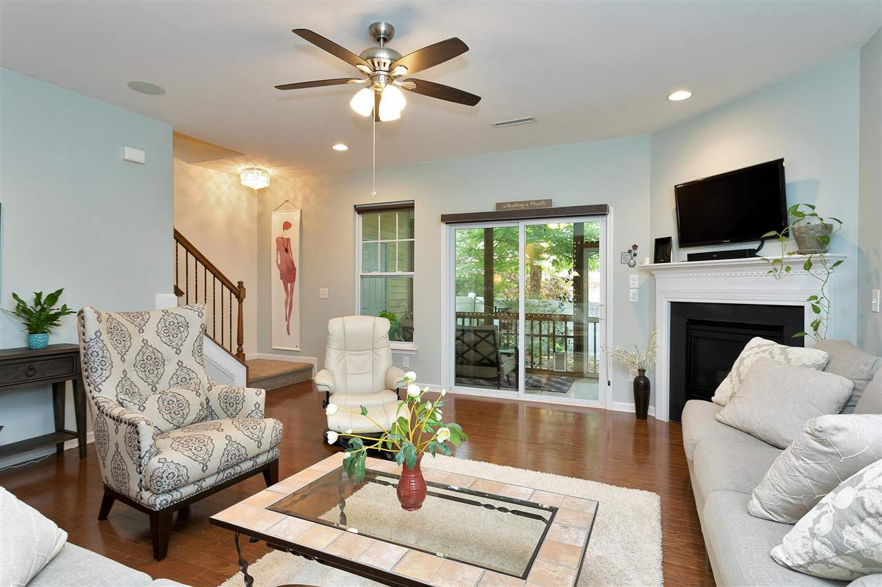2408 Memory Ridge Drive Raleigh, NC 27606 - Photo 9 of 30 Large Living Room with Ceiling Fan and Fireplace