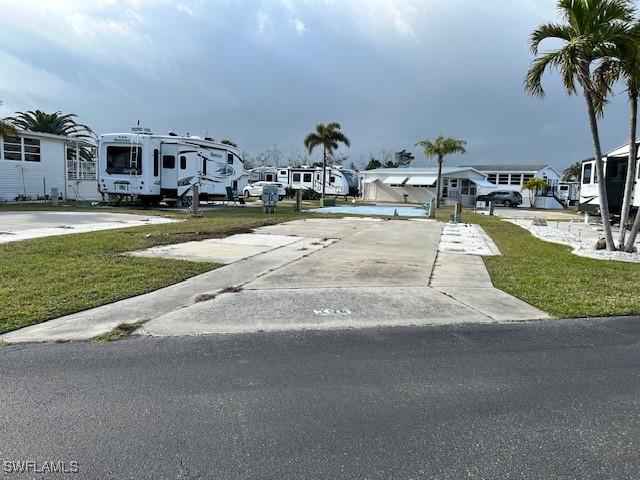 a view of multiple houses with outdoor space