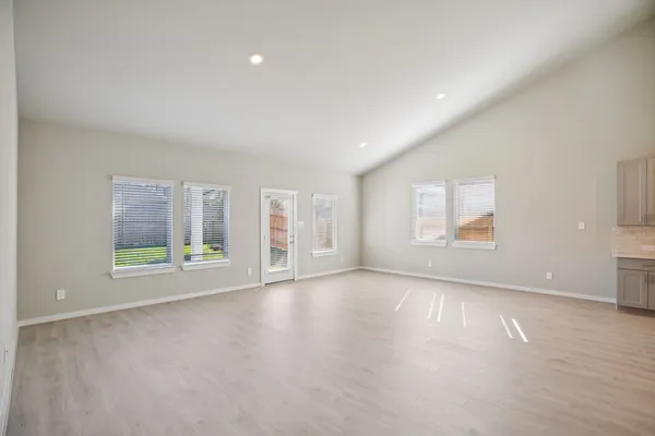 a kitchen with a sink stainless steel appliances and cabinets