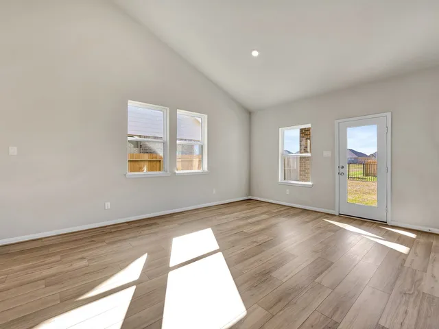 a view of an empty room and window