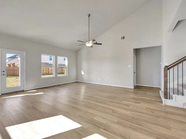 a view of a livingroom with wooden floor