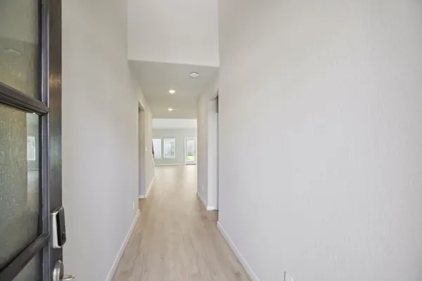 a view of a kitchen with a sink cabinets and a living room