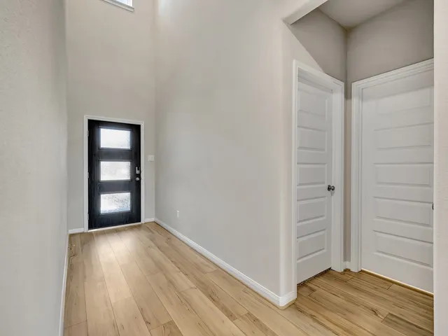 a view of wooden floor in an empty room