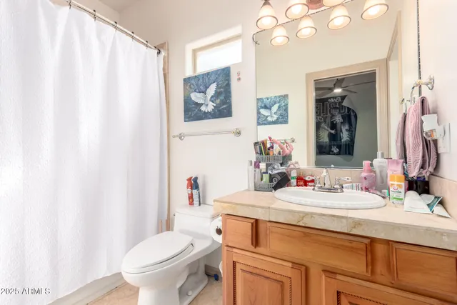 a kitchen with stainless steel appliances granite countertop a sink and a microwave oven
