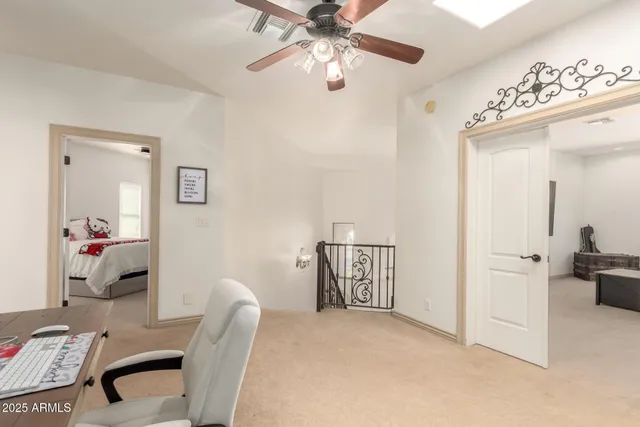 a view of a porch with potted plants
