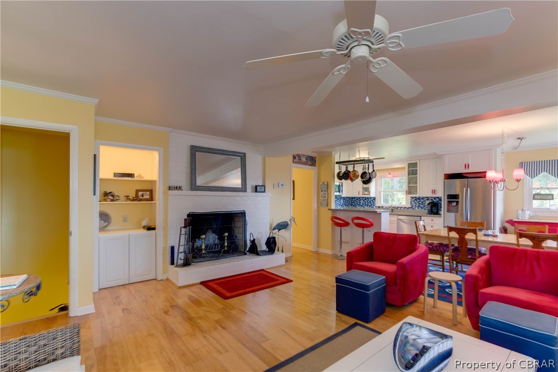 351 Reeves Road Hudgins, VA 23076 - Photo 12 of 41 a living room with furniture fireplace and flat screen tv