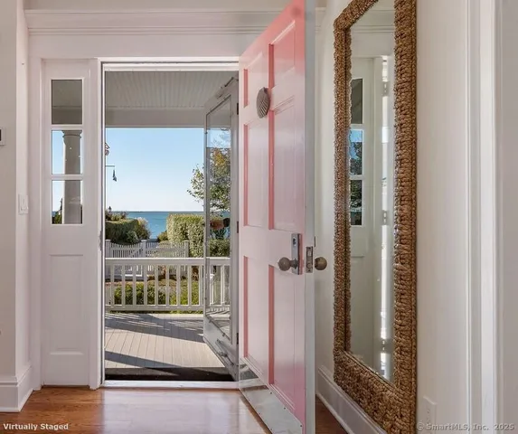 a view of a glass door and a porch