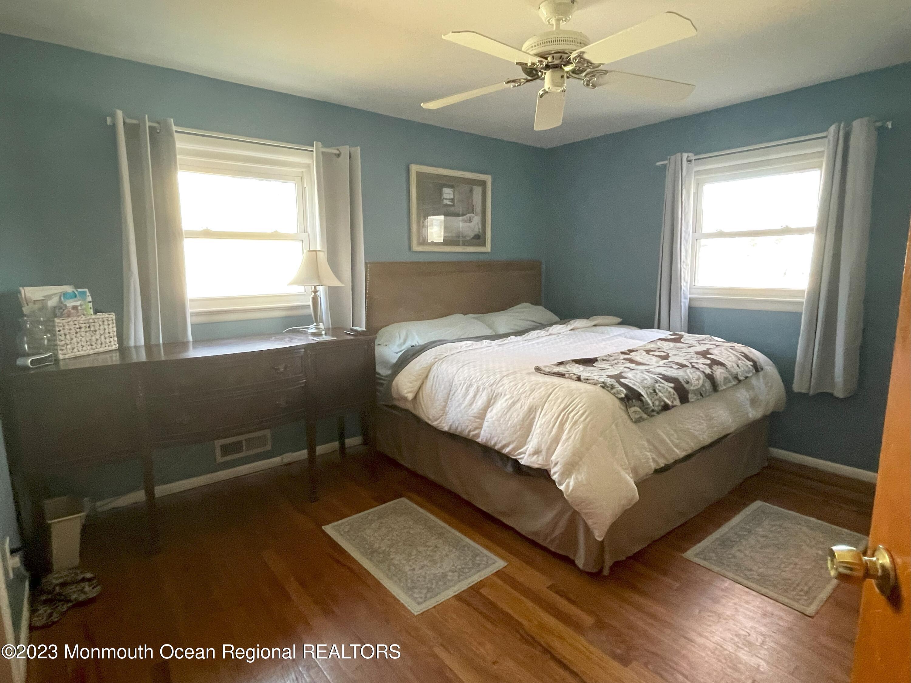 309 Midstreams Road Brick, NJ 08724 - Photo 12 of 26 a bedroom with a bed and window