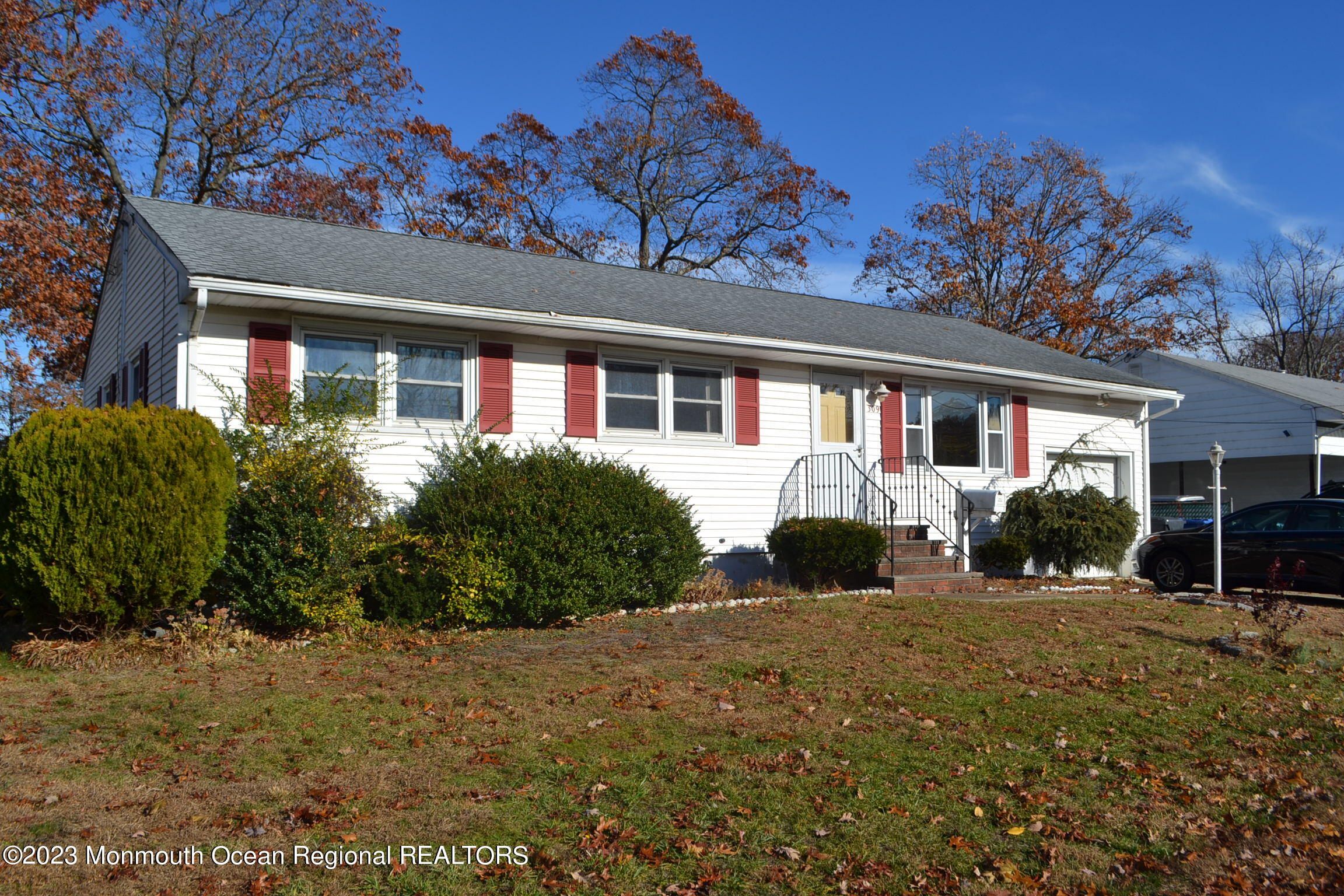 309 Midstreams Road Brick, NJ 08724 - Photo 2 of 26 a front view of a house with a yard