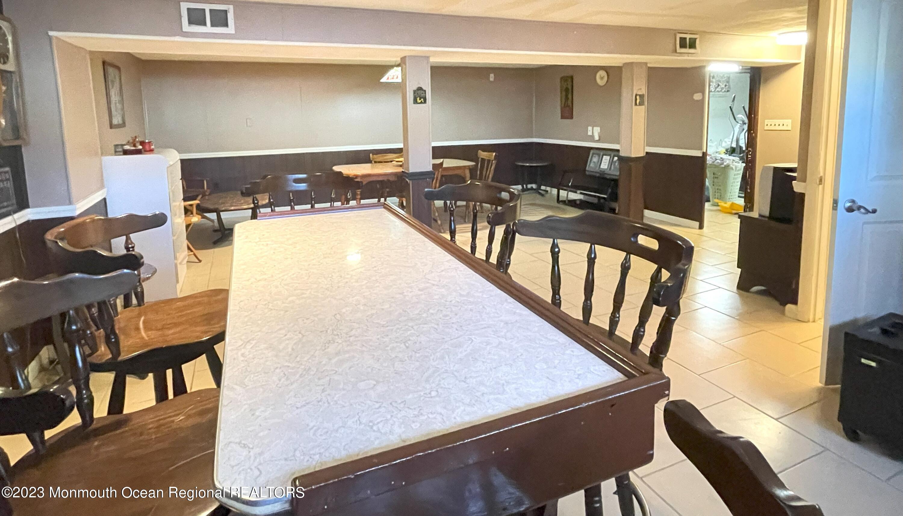 309 Midstreams Road Brick, NJ 08724 - Photo 21 of 26 a balcony with table and chairs