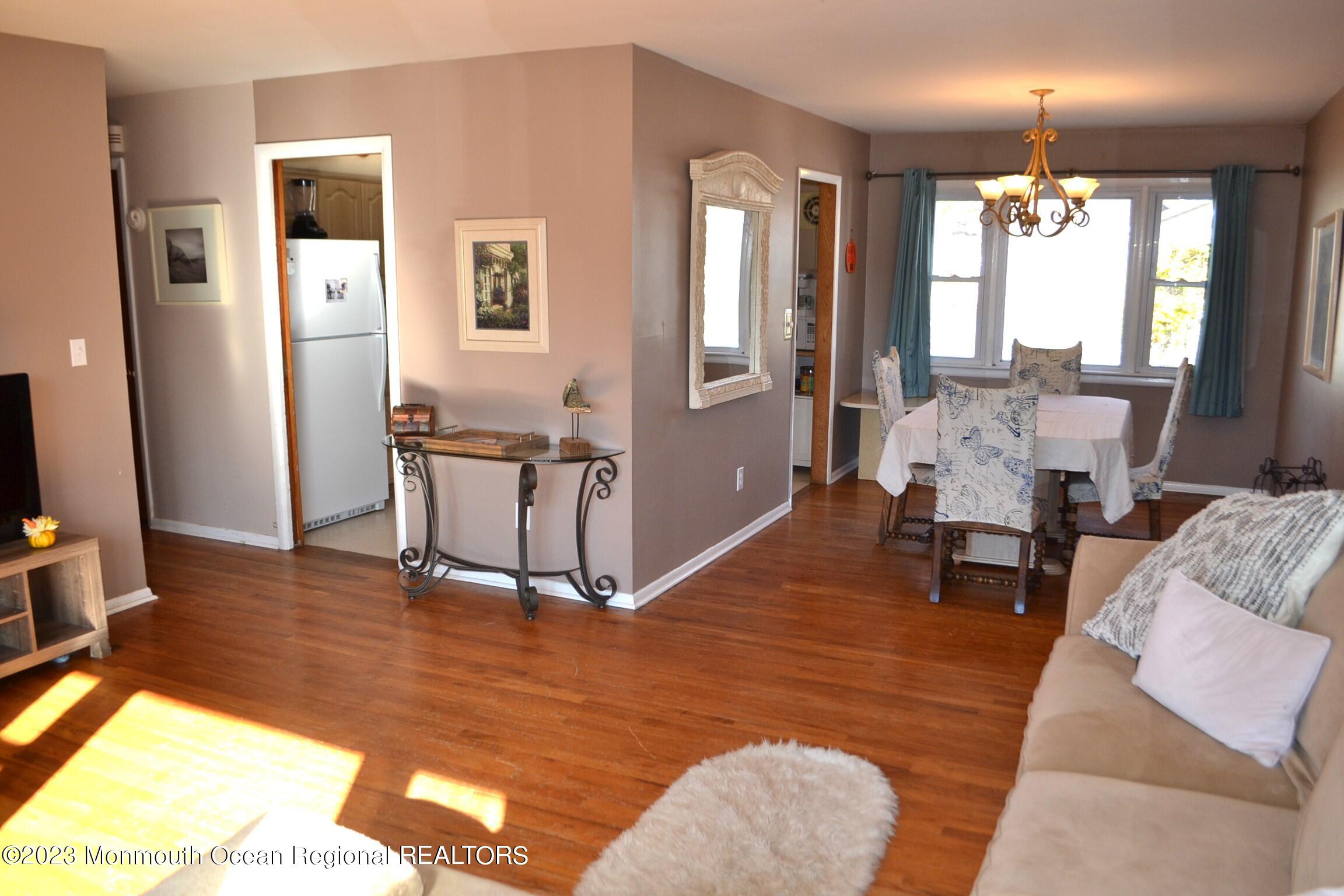 309 Midstreams Road Brick, NJ 08724 - Photo 5 of 26 a living room with furniture and a table