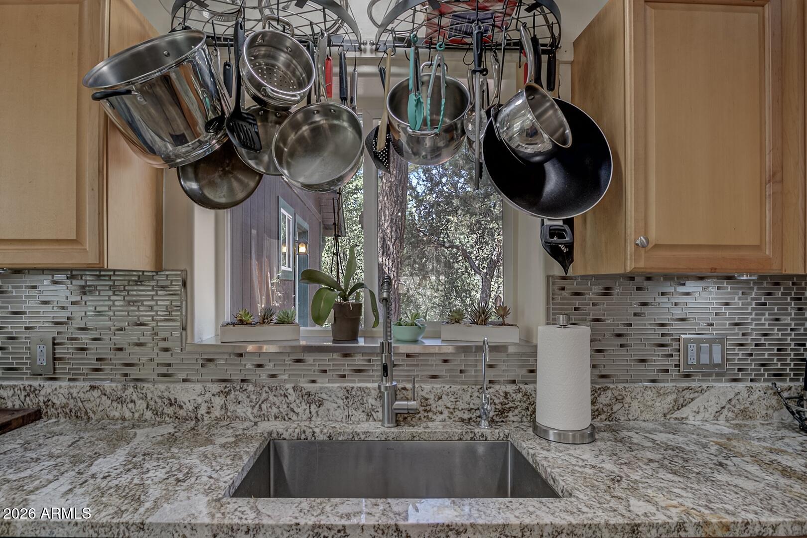 3762 Watertank Road Pine, AZ 85544 - Photo 11 of 38 a bathroom with a sink and a mirror