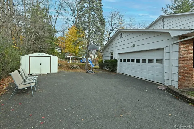 a view of a house with a back yard