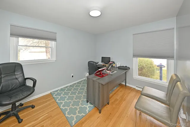 a bed room with a bed and a chair