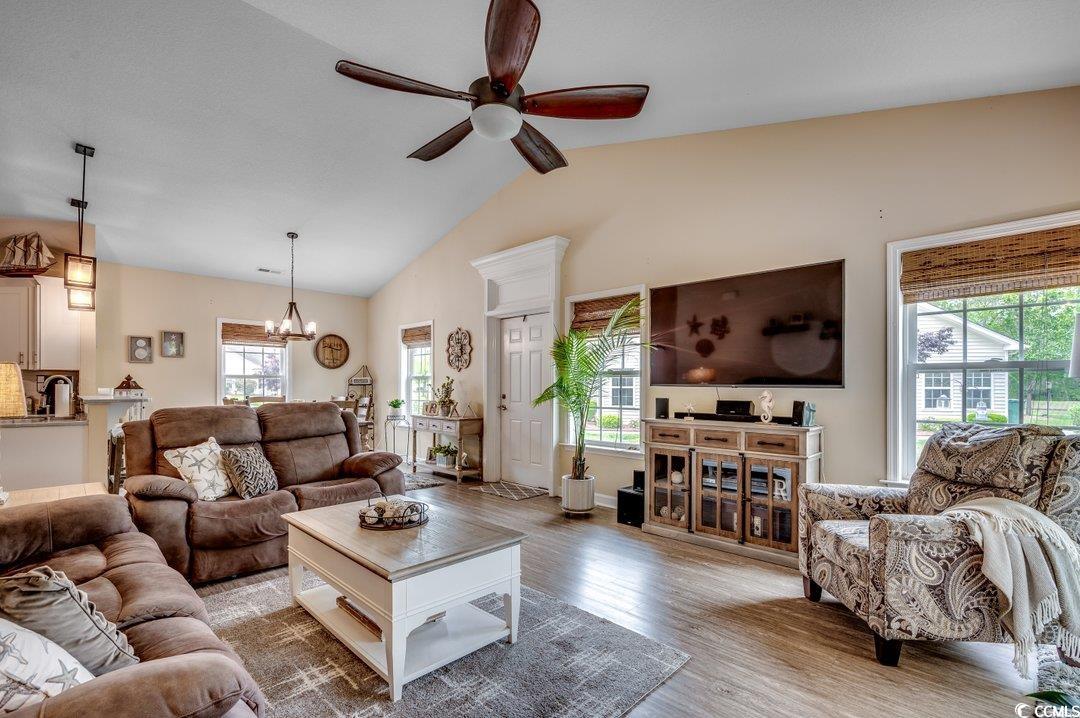 196 Rose Water Loop Myrtle Beach, SC 29588 - Photo 5 of 24 Living area with lofted ceiling, ceiling fan with