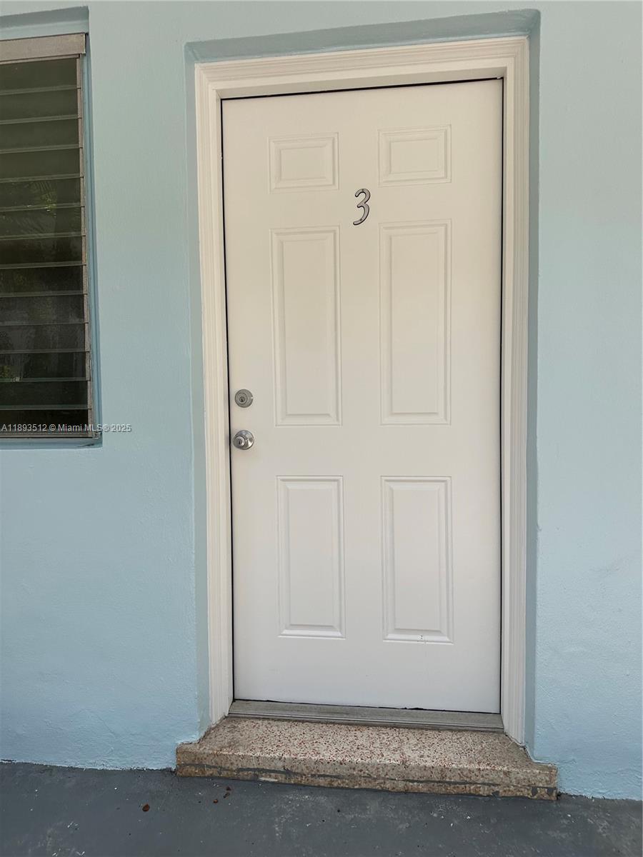 790 81st Street, Unit 3 Miami Beach, FL 33141 - Photo 2 of 10 a view of a door