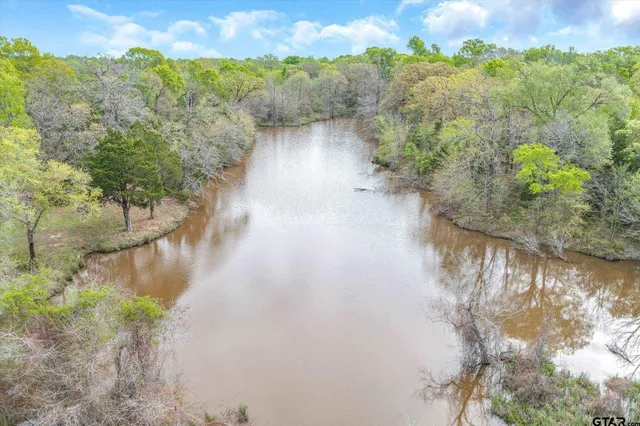 a view of a lake from a yard